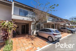 Casa em Condomínio à venda com 159m², 3 dormitórios, 1 suíte, 2 vagas, no bairro Tristeza em PORTO ALEGRE