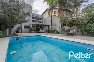 Casa à venda com 284m², 3 dormitórios, 1 suíte, 3 vagas, no bairro Tristeza em Porto Alegre