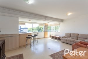 Apartamento à venda com 106m², 3 dormitórios, 1 suíte, 2 vagas, no bairro Menino Deus em Porto Alegre