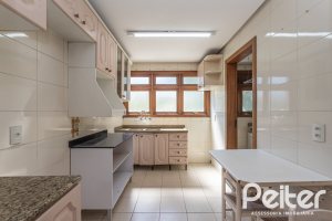 Apartamento à venda com 106m², 3 dormitórios, 1 suíte, 2 vagas, no bairro Menino Deus em Porto Alegre