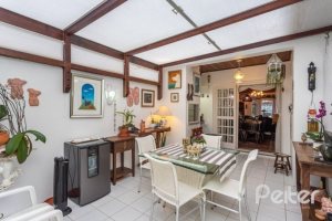 Casa em Condomínio à venda com 227m², 3 dormitórios, 1 suíte, 3 vagas, no bairro Tristeza em Porto Alegre