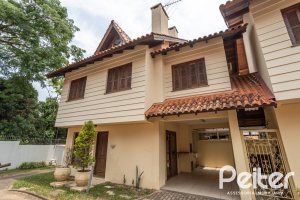 Casa em Condomínio à venda com 132m², 3 dormitórios, 1 suíte, 2 vagas, no bairro Guarujá em Porto Alegre