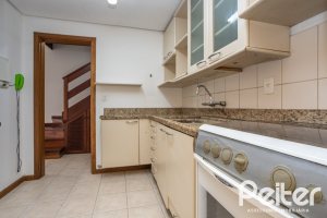 Casa em Condomínio à venda com 132m², 3 dormitórios, 1 suíte, 2 vagas, no bairro Guarujá em Porto Alegre