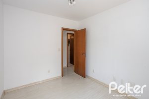 Casa em Condomínio à venda com 132m², 3 dormitórios, 1 suíte, 2 vagas, no bairro Guarujá em Porto Alegre