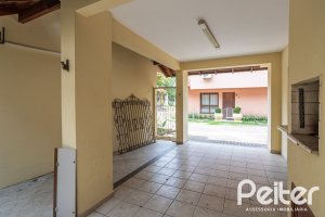 Casa em Condomínio à venda com 132m², 3 dormitórios, 1 suíte, 2 vagas, no bairro Guarujá em Porto Alegre