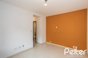 Casa em Condomínio à venda com 132m², 3 dormitórios, 1 suíte, 2 vagas, no bairro Guarujá em Porto Alegre