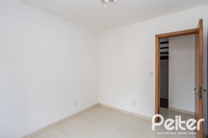 Casa em Condomínio à venda com 132m², 3 dormitórios, 1 suíte, 2 vagas, no bairro Guarujá em Porto Alegre