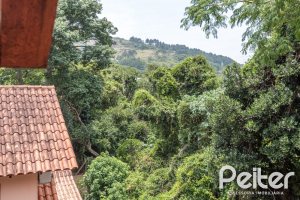 Casa em Condomínio à venda com 132m², 3 dormitórios, 1 suíte, 2 vagas, no bairro Guarujá em Porto Alegre