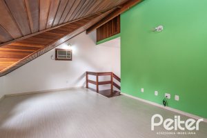 Casa em Condomínio à venda com 132m², 3 dormitórios, 1 suíte, 2 vagas, no bairro Guarujá em Porto Alegre