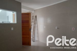 Casa à venda com 74m², 2 dormitórios, 1 suíte, 2 vagas, no bairro Nonoai em Porto Alegre