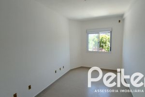 Casa à venda com 74m², 2 dormitórios, 1 suíte, 2 vagas, no bairro Nonoai em Porto Alegre