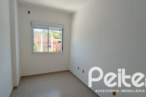 Casa à venda com 74m², 2 dormitórios, 1 suíte, 2 vagas, no bairro Nonoai em Porto Alegre