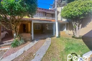 Casa em Condomínio à venda com 122m², 3 dormitórios, 2 vagas, no bairro Cavalhada em Porto Alegre