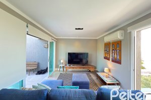 Casa em Condomínio à venda com 271m², 3 dormitórios, 1 suíte, 2 vagas, no bairro Vila Assunção em Porto Alegre