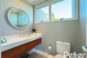 Casa em Condomínio à venda com 271m², 3 dormitórios, 1 suíte, 2 vagas, no bairro Vila Assunção em Porto Alegre