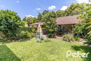 Casa à venda com 170m², 3 dormitórios, 1 suíte, 2 vagas, no bairro Ipanema em Porto Alegre