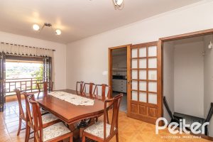 Casa à venda com 226m², 3 dormitórios, 1 suíte, 4 vagas, no bairro Ipanema em Porto Alegre