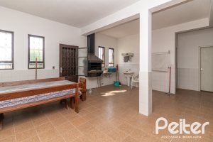 Casa à venda com 226m², 3 dormitórios, 1 suíte, 4 vagas, no bairro Ipanema em Porto Alegre