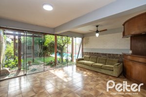 Casa à venda com 227m², 3 dormitórios, 1 suíte, 3 vagas, no bairro Tristeza em Porto Alegre