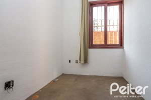 Casa à venda com 227m², 3 dormitórios, 1 suíte, 3 vagas, no bairro Tristeza em Porto Alegre