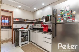 Casa em Condomínio à venda com 186m², 3 dormitórios, 1 suíte, 2 vagas, no bairro Hípica em Porto Alegre