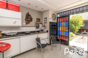 Casa em Condomínio à venda com 186m², 3 dormitórios, 1 suíte, 2 vagas, no bairro Hípica em Porto Alegre