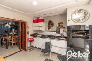 Casa em Condomínio à venda com 186m², 3 dormitórios, 1 suíte, 2 vagas, no bairro Hípica em Porto Alegre