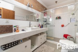 Casa em Condomínio à venda com 186m², 3 dormitórios, 1 suíte, 2 vagas, no bairro Hípica em Porto Alegre