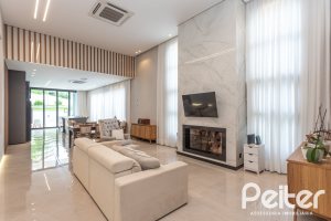 Casa em Condomínio à venda com 303m², 4 dormitórios, 4 suítes, 4 vagas, no bairro Alphaville em PORTO ALEGRE