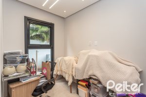 Casa em Condomínio à venda com 303m², 4 dormitórios, 4 suítes, 4 vagas, no bairro Alphaville em PORTO ALEGRE