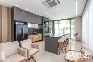 Casa em Condomínio à venda com 303m², 4 dormitórios, 4 suítes, 4 vagas, no bairro Alphaville em PORTO ALEGRE