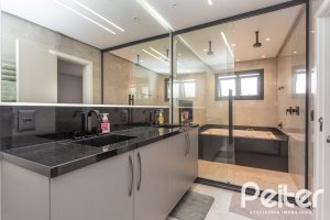 Casa em Condomínio à venda com 303m², 4 dormitórios, 4 suítes, 4 vagas, no bairro Alphaville em PORTO ALEGRE