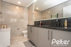 Casa em Condomínio à venda com 303m², 4 dormitórios, 4 suítes, 4 vagas, no bairro Alphaville em PORTO ALEGRE