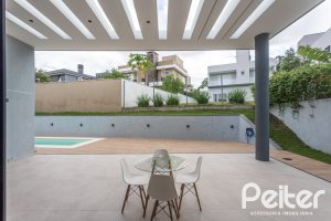 Casa em Condomínio à venda com 303m², 4 dormitórios, 4 suítes, 4 vagas, no bairro Alphaville em PORTO ALEGRE