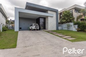 Casa em Condomínio à venda com 303m², 4 dormitórios, 4 suítes, 4 vagas, no bairro Alphaville em PORTO ALEGRE