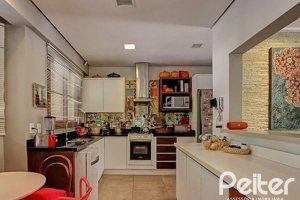 Casa em Condomínio à venda com 338m², 3 dormitórios, 1 suíte, 2 vagas, no bairro Tristeza em PORTO ALEGRE