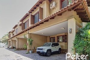 Casa em Condomínio à venda com 338m², 3 dormitórios, 1 suíte, 2 vagas, no bairro Tristeza em PORTO ALEGRE