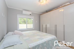 Casa à venda com 155m², 3 dormitórios, 3 suítes, 2 vagas, no bairro Espírito Santo em Porto Alegre