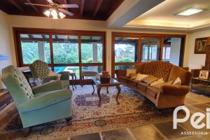 Casa em Condomínio à venda com 299m², 3 dormitórios, 1 suíte, 4 vagas, no bairro Cavalhada em PORTO ALEGRE