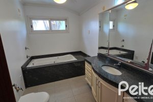 Casa em Condomínio à venda com 299m², 3 dormitórios, 1 suíte, 4 vagas, no bairro Cavalhada em PORTO ALEGRE