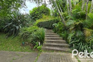 Casa em Condomínio à venda com 299m², 3 dormitórios, 1 suíte, 4 vagas, no bairro Cavalhada em PORTO ALEGRE