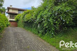 Casa em Condomínio à venda com 299m², 3 dormitórios, 1 suíte, 4 vagas, no bairro Cavalhada em PORTO ALEGRE