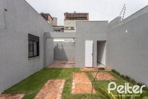 Casa à venda com 120m², 3 dormitórios, 1 suíte, 2 vagas, no bairro Tristeza em Porto Alegre
