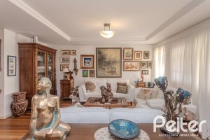 Casa em Condomínio à venda com 259m², 3 dormitórios, 1 suíte, 3 vagas, no bairro Vila Nova em Porto Alegre