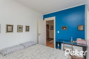 Casa em Condomínio à venda com 259m², 3 dormitórios, 1 suíte, 3 vagas, no bairro Vila Nova em Porto Alegre