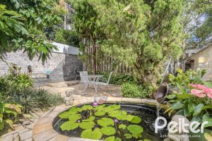 Casa em Condomínio à venda com 259m², 3 dormitórios, 1 suíte, 3 vagas, no bairro Vila Nova em Porto Alegre