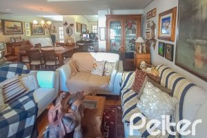 Casa em Condomínio à venda com 259m², 3 dormitórios, 1 suíte, 3 vagas, no bairro Vila Nova em Porto Alegre