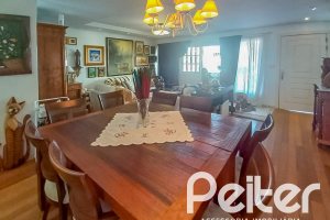 Casa em Condomínio à venda com 259m², 3 dormitórios, 1 suíte, 3 vagas, no bairro Vila Nova em Porto Alegre