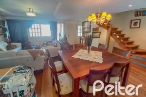 Casa em Condomínio à venda com 259m², 3 dormitórios, 1 suíte, 3 vagas, no bairro Vila Nova em Porto Alegre