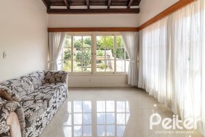 Casa à venda com 642m², 4 dormitórios, 2 suítes, 4 vagas, no bairro Ipanema em Porto Alegre